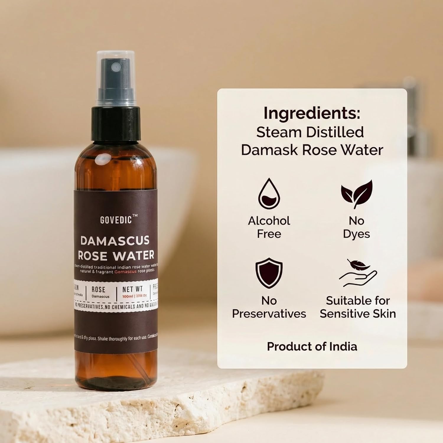 Bottle of Damascus Rose Water with a label detailing ingredients and product information on a neutral background.